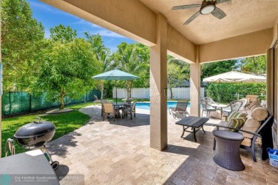 STUNNING 4-BEDROOM 3-BATHROOM POOL HOME IN THE HEART OF CORAL on Country Club of Coral Springs in Florida - for sale on GolfHomes.com, golf home, golf lot