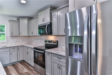 This 3/2/2 is brand new and sits on a third of an acre nicely on Citrus Springs Country Club in Florida - for sale on GolfHomes.com, golf home, golf lot