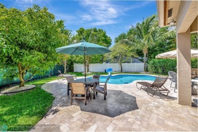 STUNNING 4-BEDROOM 3-BATHROOM POOL HOME IN THE HEART OF CORAL on Country Club of Coral Springs in Florida - for sale on GolfHomes.com, golf home, golf lot