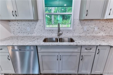 This 3/2/2 is brand new and sits on a third of an acre nicely on Citrus Springs Country Club in Florida - for sale on GolfHomes.com, golf home, golf lot