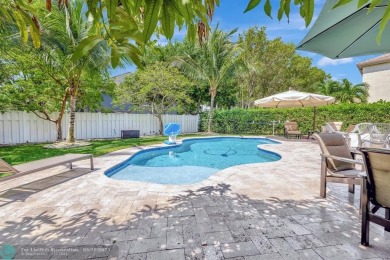 STUNNING 4-BEDROOM 3-BATHROOM POOL HOME IN THE HEART OF CORAL on Country Club of Coral Springs in Florida - for sale on GolfHomes.com, golf home, golf lot