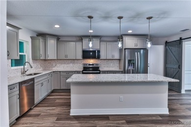 This 3/2/2 is brand new and sits on a third of an acre nicely on Citrus Springs Country Club in Florida - for sale on GolfHomes.com, golf home, golf lot