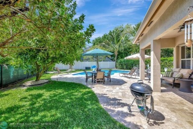 STUNNING 4-BEDROOM 3-BATHROOM POOL HOME IN THE HEART OF CORAL on Country Club of Coral Springs in Florida - for sale on GolfHomes.com, golf home, golf lot
