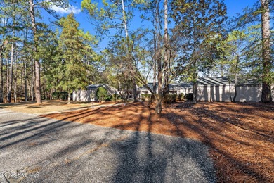 Welcome to this quaint waterfront and golf view Condo. Enjoy on Whispering Pines Golf Course in North Carolina - for sale on GolfHomes.com, golf home, golf lot