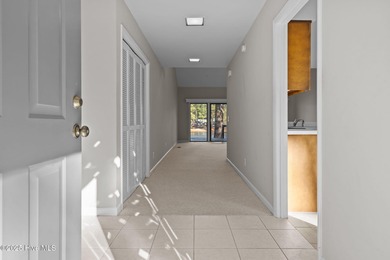 Welcome to this quaint waterfront and golf view Condo. Enjoy on Whispering Pines Golf Course in North Carolina - for sale on GolfHomes.com, golf home, golf lot
