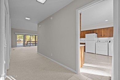 Welcome to this quaint waterfront and golf view Condo. Enjoy on Whispering Pines Golf Course in North Carolina - for sale on GolfHomes.com, golf home, golf lot