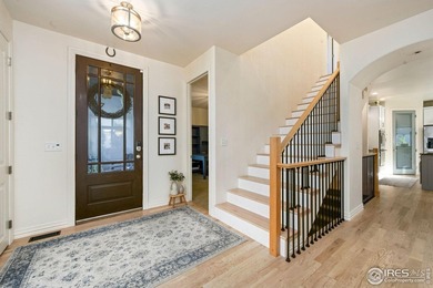 Showstopping 1 1/2-Story Gem in Water Valley! This stunning home on Pelican Lakes Golf and Country Club in Colorado - for sale on GolfHomes.com, golf home, golf lot