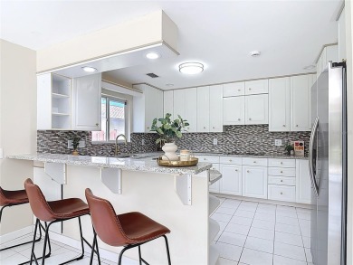 Step inside 289 S Gull Drive and experience why life is truly on The Club At Pelican Bay - North Course in Florida - for sale on GolfHomes.com, golf home, golf lot