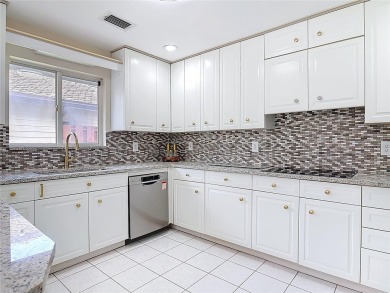 Step inside 289 S Gull Drive and experience why life is truly on The Club At Pelican Bay - North Course in Florida - for sale on GolfHomes.com, golf home, golf lot