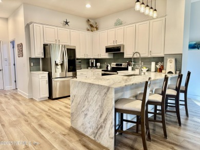 Welcome to this beautifully updated 3,047 sqft 4 bedroom/3 bath on Queens Harbour Yacht and Country Club in Florida - for sale on GolfHomes.com, golf home, golf lot