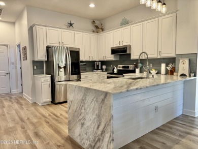 Welcome to this beautifully updated 3,047 sqft 4 bedroom/3 bath on Queens Harbour Yacht and Country Club in Florida - for sale on GolfHomes.com, golf home, golf lot