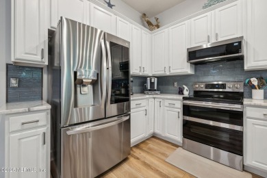 Welcome to this beautifully updated 3,047 sqft 4 bedroom/3 bath on Queens Harbour Yacht and Country Club in Florida - for sale on GolfHomes.com, golf home, golf lot