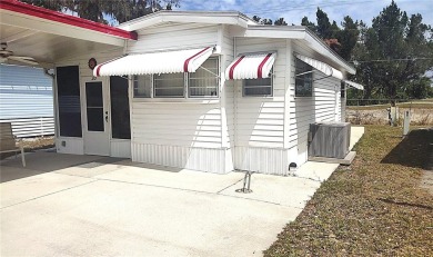 Check out one of the only homes for sale along the golf course! on River Run Golf Links in Florida - for sale on GolfHomes.com, golf home, golf lot