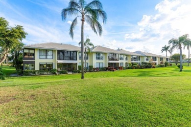 Enjoy gorgeous golf course and lake views from this stunning on Quail Ridge Golf Course and Country Club in Florida - for sale on GolfHomes.com, golf home, golf lot