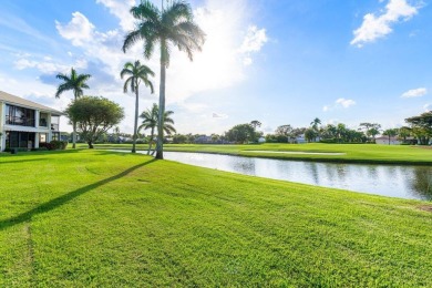 Enjoy gorgeous golf course and lake views from this stunning on Quail Ridge Golf Course and Country Club in Florida - for sale on GolfHomes.com, golf home, golf lot