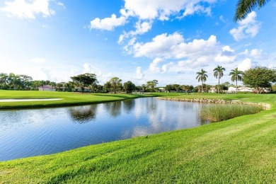 Enjoy gorgeous golf course and lake views from this stunning on Quail Ridge Golf Course and Country Club in Florida - for sale on GolfHomes.com, golf home, golf lot