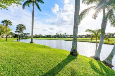 Enjoy gorgeous golf course and lake views from this stunning on Quail Ridge Golf Course and Country Club in Florida - for sale on GolfHomes.com, golf home, golf lot