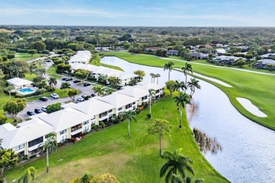 Enjoy gorgeous golf course and lake views from this stunning on Quail Ridge Golf Course and Country Club in Florida - for sale on GolfHomes.com, golf home, golf lot