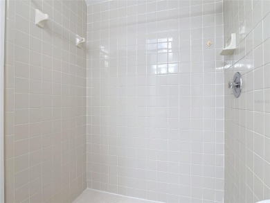 Step inside 289 S Gull Drive and experience why life is truly on The Club At Pelican Bay - North Course in Florida - for sale on GolfHomes.com, golf home, golf lot