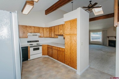 Beautiful Townhome with Mountain Views Bordering Black Canyon on Black Canyon Golf Club At Montrose in Colorado - for sale on GolfHomes.com, golf home, golf lot