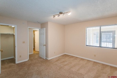 Beautiful Townhome with Mountain Views Bordering Black Canyon on Black Canyon Golf Club At Montrose in Colorado - for sale on GolfHomes.com, golf home, golf lot