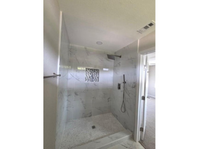 Welcome to this charming 4-bedroom, 3-bathroom home in Cedar on Cedar Crest Golf Course in Texas - for sale on GolfHomes.com, golf home, golf lot