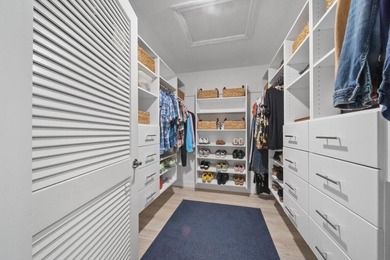 This 4BR/3BA CBS pool home sits on a private 1-acre cul-de-sac on Evergreen Club in Florida - for sale on GolfHomes.com, golf home, golf lot