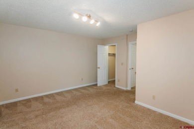 Beautiful Townhome with Mountain Views Bordering Black Canyon on Black Canyon Golf Club At Montrose in Colorado - for sale on GolfHomes.com, golf home, golf lot