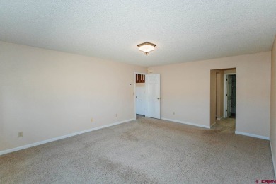 Beautiful Townhome with Mountain Views Bordering Black Canyon on Black Canyon Golf Club At Montrose in Colorado - for sale on GolfHomes.com, golf home, golf lot