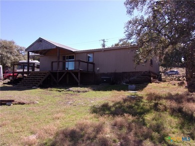 Updated 3/2 double wide mfg. home with hill country views! Home on Rebecca Creek Golf Club in Texas - for sale on GolfHomes.com, golf home, golf lot