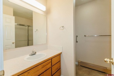 Beautiful Townhome with Mountain Views Bordering Black Canyon on Black Canyon Golf Club At Montrose in Colorado - for sale on GolfHomes.com, golf home, golf lot