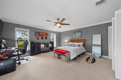 This 4BR/3BA CBS pool home sits on a private 1-acre cul-de-sac on Evergreen Club in Florida - for sale on GolfHomes.com, golf home, golf lot