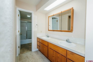 Beautiful Townhome with Mountain Views Bordering Black Canyon on Black Canyon Golf Club At Montrose in Colorado - for sale on GolfHomes.com, golf home, golf lot