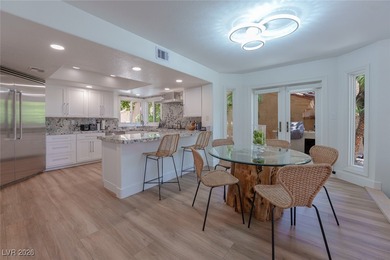 STUNNING REMODEL ON DOUBLE FAIRWAY OF GOLF COURSE OVERLOOKING on Spanish Trail Golf and Country Club in Nevada - for sale on GolfHomes.com, golf home, golf lot