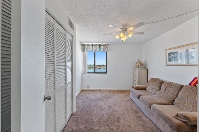 BEST PRICE IN ISLA DEL SOL! This spacious 2BR condo has on Isla Del Sol Yacht and Country Club in Florida - for sale on GolfHomes.com, golf home, golf lot