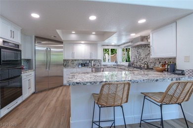 STUNNING REMODEL ON DOUBLE FAIRWAY OF GOLF COURSE OVERLOOKING on Spanish Trail Golf and Country Club in Nevada - for sale on GolfHomes.com, golf home, golf lot