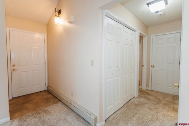 Beautiful Townhome with Mountain Views Bordering Black Canyon on Black Canyon Golf Club At Montrose in Colorado - for sale on GolfHomes.com, golf home, golf lot