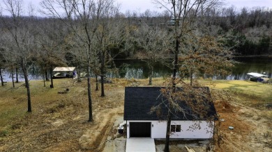 Seller offering $5,000 towards buyer's concessions!  Discover an on Cherokee Village South Course in Arkansas - for sale on GolfHomes.com, golf home, golf lot