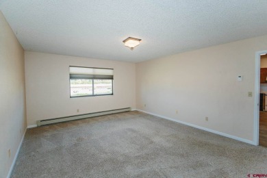 Beautiful Townhome with Mountain Views Bordering Black Canyon on Black Canyon Golf Club At Montrose in Colorado - for sale on GolfHomes.com, golf home, golf lot