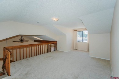 Beautiful Townhome with Mountain Views Bordering Black Canyon on Black Canyon Golf Club At Montrose in Colorado - for sale on GolfHomes.com, golf home, golf lot