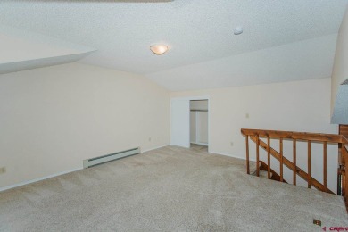 Beautiful Townhome with Mountain Views Bordering Black Canyon on Black Canyon Golf Club At Montrose in Colorado - for sale on GolfHomes.com, golf home, golf lot