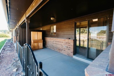 Beautiful Townhome with Mountain Views Bordering Black Canyon on Black Canyon Golf Club At Montrose in Colorado - for sale on GolfHomes.com, golf home, golf lot