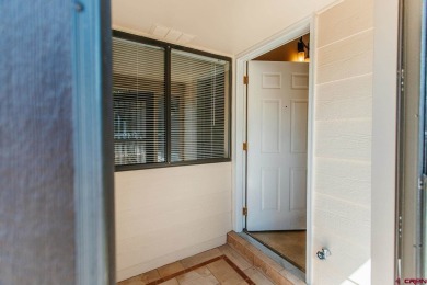 Beautiful Townhome with Mountain Views Bordering Black Canyon on Black Canyon Golf Club At Montrose in Colorado - for sale on GolfHomes.com, golf home, golf lot