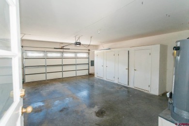 Beautiful Townhome with Mountain Views Bordering Black Canyon on Black Canyon Golf Club At Montrose in Colorado - for sale on GolfHomes.com, golf home, golf lot