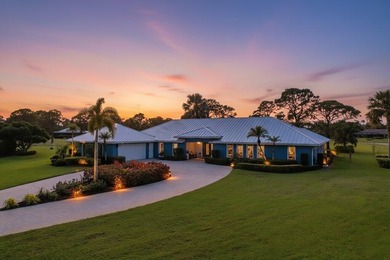 This 4BR/3BA CBS pool home sits on a private 1-acre cul-de-sac on Evergreen Club in Florida - for sale on GolfHomes.com, golf home, golf lot