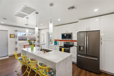 Welcome home! Step into this sun-drenched sanctuary, where on Sorrento Par 3 in Florida - for sale on GolfHomes.com, golf home, golf lot