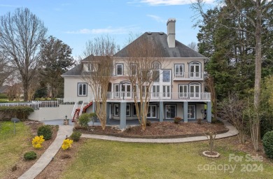 Waterfront home nestled in the prestigious Peninsula community on The Peninsula Club in North Carolina - for sale on GolfHomes.com, golf home, golf lot