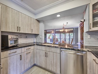 Beautifully remodeled condo for sale in the heart of Boynton on Indian Spring Golf and Country Club in Florida - for sale on GolfHomes.com, golf home, golf lot