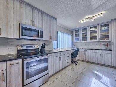Beautifully remodeled condo for sale in the heart of Boynton on Indian Spring Golf and Country Club in Florida - for sale on GolfHomes.com, golf home, golf lot