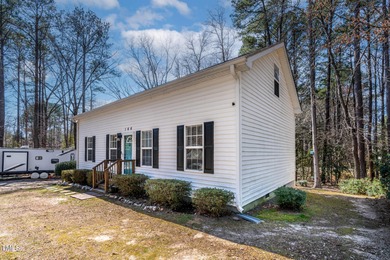 A MUST SEE! Charming 2-Bedroom, 2-Bathroom Cottage in the Gated on River Golf and Country Club at Lake Royale in North Carolina - for sale on GolfHomes.com, golf home, golf lot